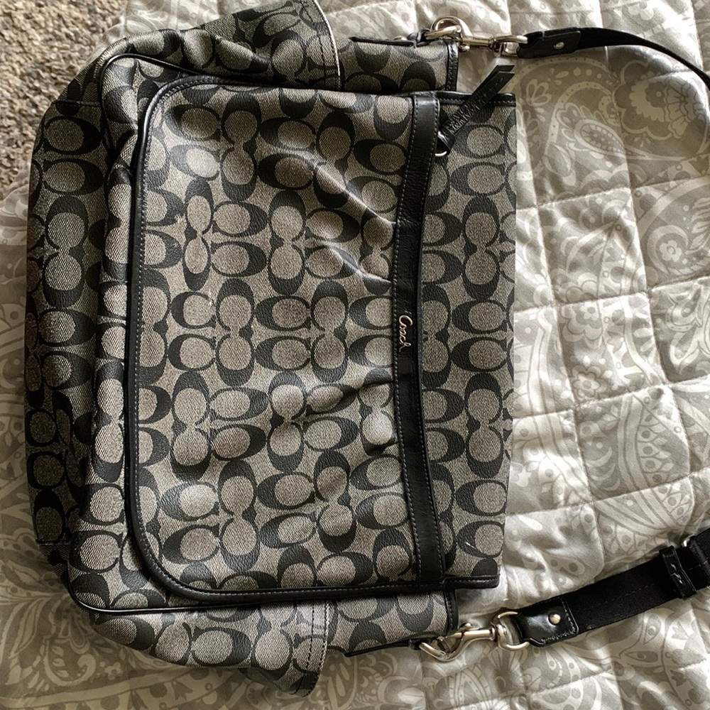 Black coach computer bag. Still in good condition.